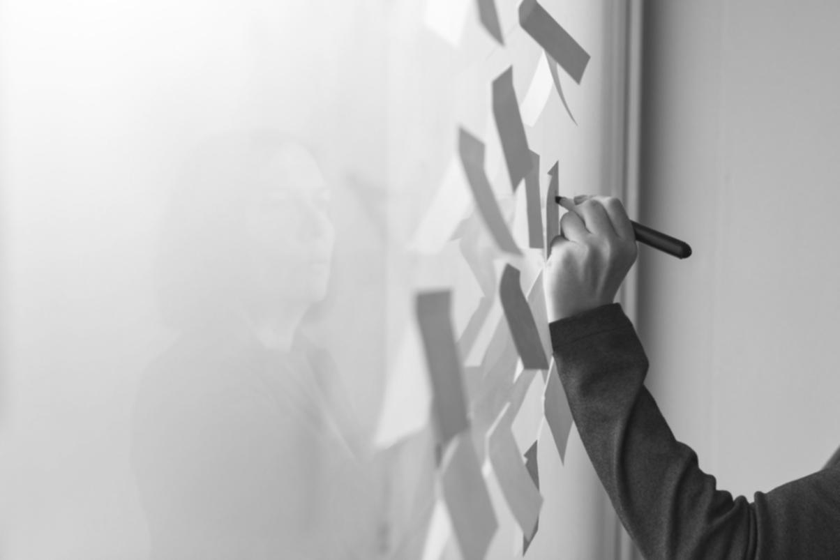 Students engaged in financial analysis discussion during live market session